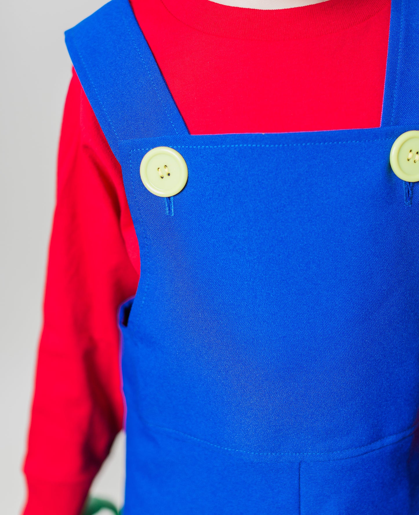 Let your little hero jump into adventure with this handmade Mario Bros Overalls - Blue, Red, or Green - Video Game Party Outfit – Brothers Costume – Birthday Gift for Kids.